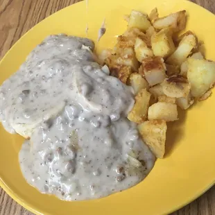 Sausage gravy with an unexpected side of home fries. Yummm