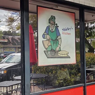 a sign in the window of a restaurant