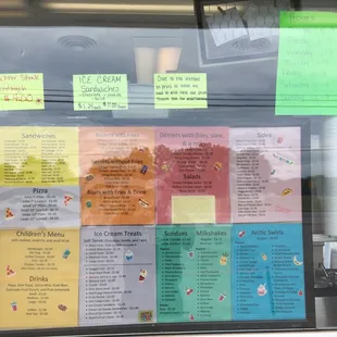 a window with a lot of sticky notes on it