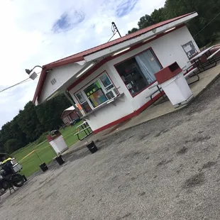 a motorcycle parked in front of a restaurant