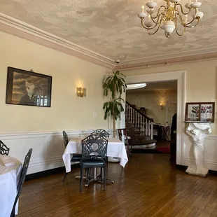 a dining room with a chandelier