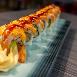 a close up of a sushi roll on a plate