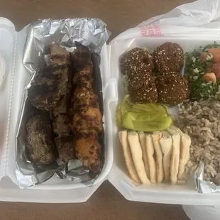 Beef, chicken, kafta kabobs with mujadara rice, tabbouleh, falafel, pita and veg.