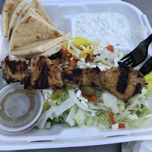 Greek Salad with dressing on the side and Chicken Breast Medallions