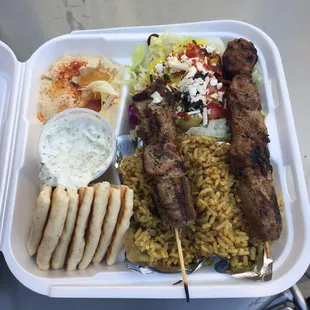 $15+ out the door for a kabob combo. With hummus, Greek salad and rice too.  Lamb and beef skewer.  Meat a little dry.