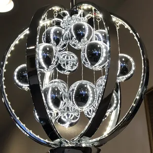 a chandelier made of glass balls