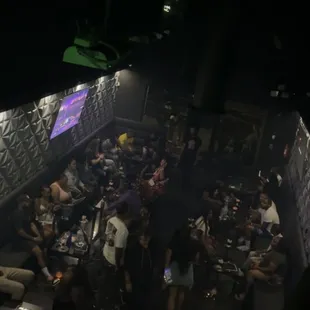 a crowd of people sitting at tables