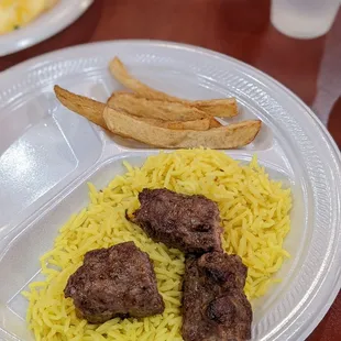 From the buffet: Seasoned rice with ground beef kabob and fries.