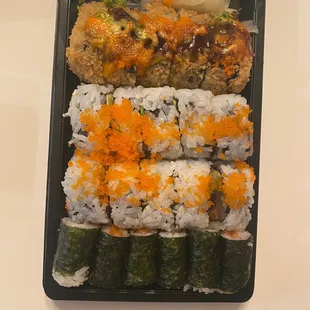 a tray of sushi