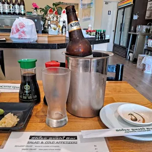 Interior of restaurant. Ice cold Kirin in ice bucket.
