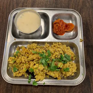 Kichdi Kadhi (a cooked rice and lentil dish) with Indian pickle