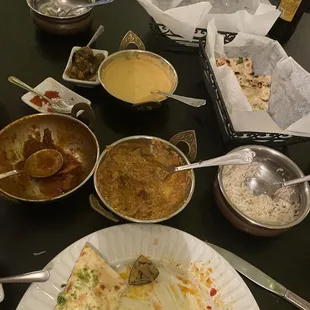 Goat vindaloo (empty bowl) and Lamb Xacuti (I should have gotten it hot) flavors were great