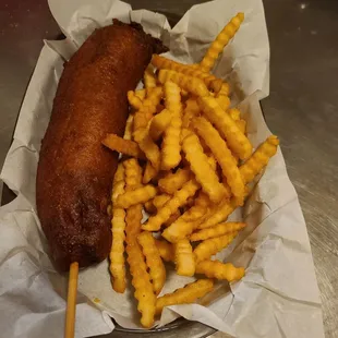 a hot dog and french fries