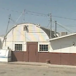 a truck parked in front of a building