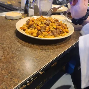 Hibachi chicken steak and eggs. Vegetable and onion and rice