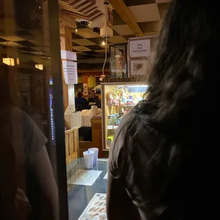 a woman looking out the window