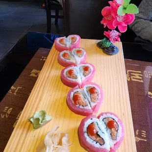 sushi rolls on a cutting board