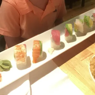 Rainbow roll pictured (1 piece missing, already ate before picture was taken lol) FRESH!