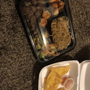 Steak and shrimp hibachi with noodles which I guess costs more if you get noodles they up charge for the noodles. And crab rangoons