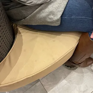 Seating Couch with Stained Cushions