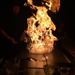 a fire in the middle of a grill