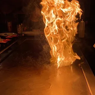 a flame coming out of the grill