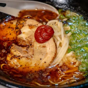 a close up of a bowl of ramen