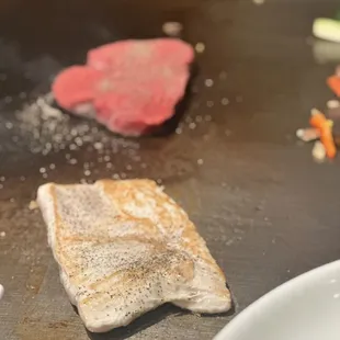 a piece of meat on a grill