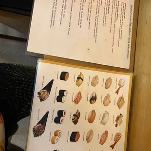 a menu with a variety of sushi items