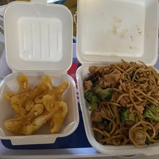 two take out containers of food