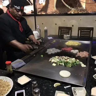 Chef cooking our food at the hibachi grill
