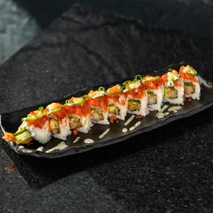 a close up of a plate of sushi