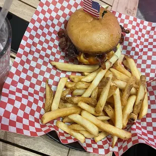 BBQ Bacon Cheeseburger  Crispy hickory-smoked bacon and American cheese, topped with tangy BBQ sauce.