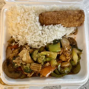 Kung Pao chicken combination with white rice and egg roll.