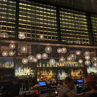 people sitting at a bar