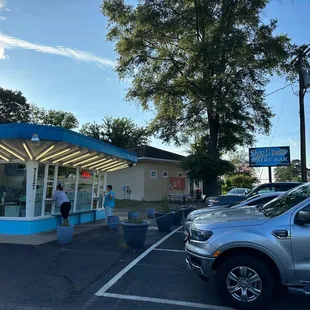 a man standing in a parking lot