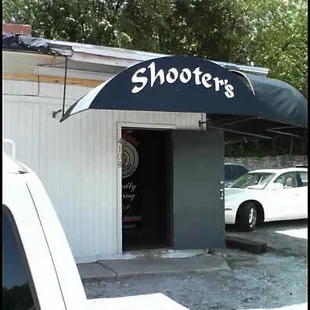 a car parked in front of a store