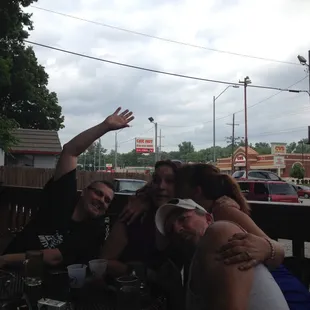 a group of people sitting at a table