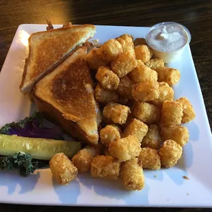 Chicken tenders sandwiche and tots