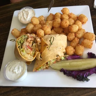 Buffalo chicken wrap and tater tots