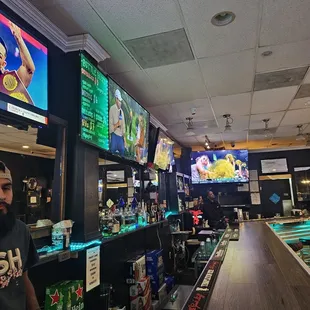 two men watching televisions