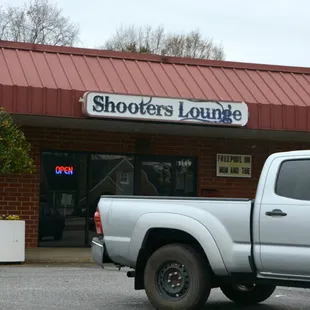 truck parked in front of store