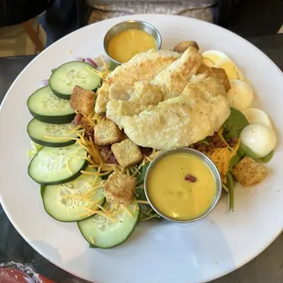 Cobb Salad with chicken and honey mustard dressing.