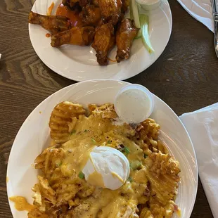 Wings and loaded potatoes