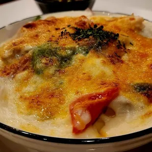 Baked seafood over rice