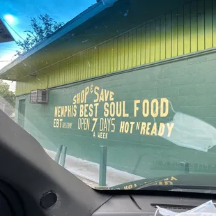 a sign on the windshield of a car