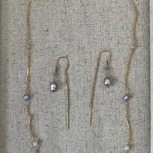 Custom necklace and earrings with lilac keshi pearls and a Sakura Gold Pendant
