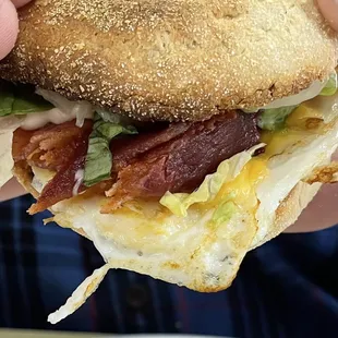 Bacon, egg and cheese on English muffin. With lettuce, onion and mayo.