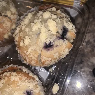 blueberry muffins in a plastic container