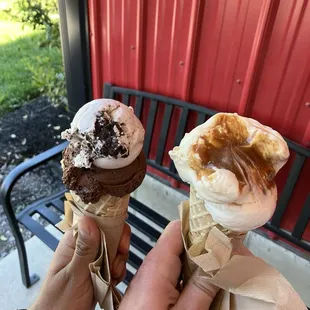 2 scoops on waffle cone 1st cone (left)-Cookies and Cream , Dark Chocolate  2nd cone (right) Salted Caramel